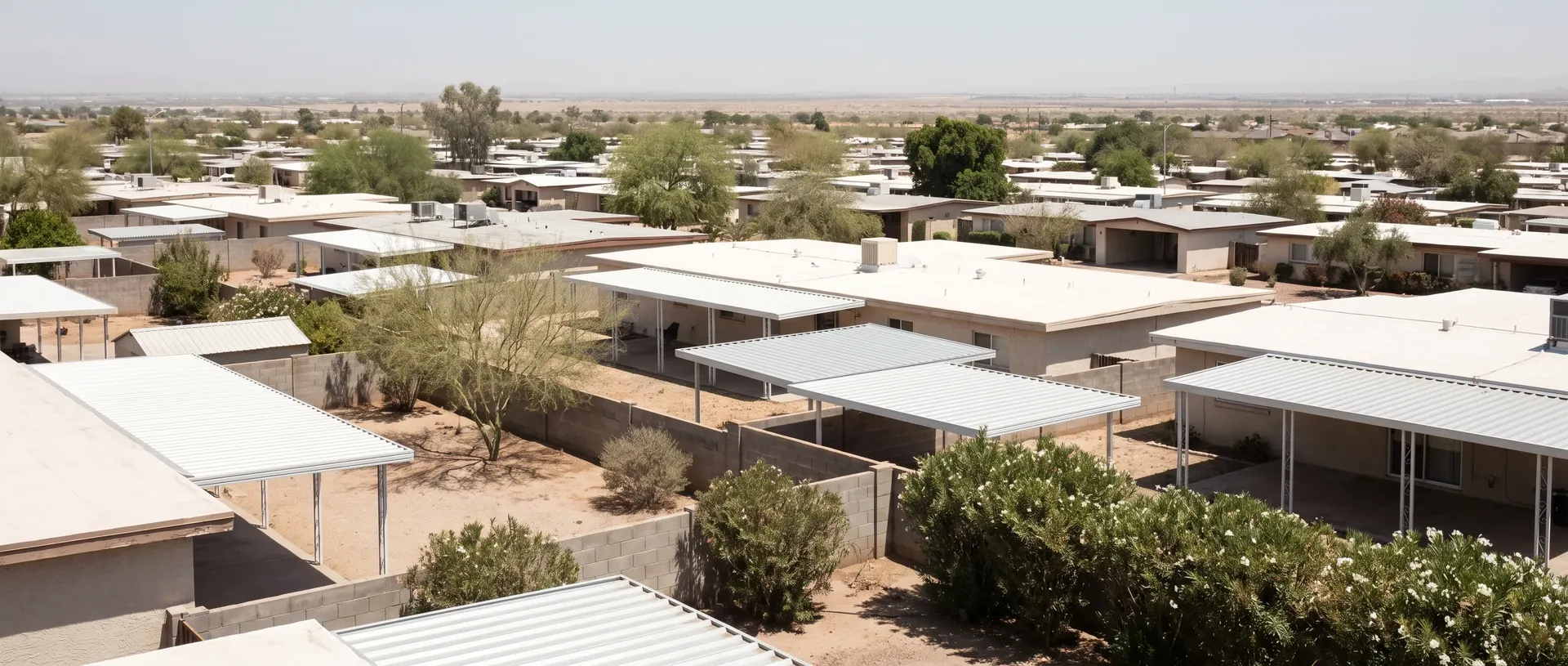 Metal patio covers and carports across a metro Phoenix suburb from above