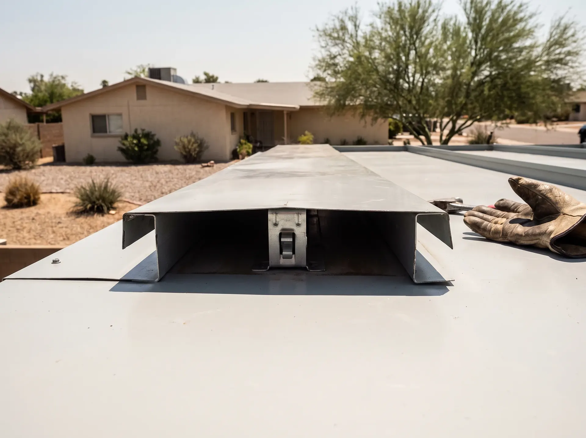 Separated standing seam on a contemporary desert home roof